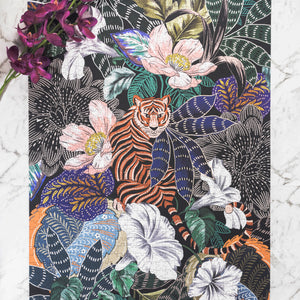 
                  
                    Tiger Utopia 1000 piece puzzle. Tiger surrounded by plants and flowers
                  
                